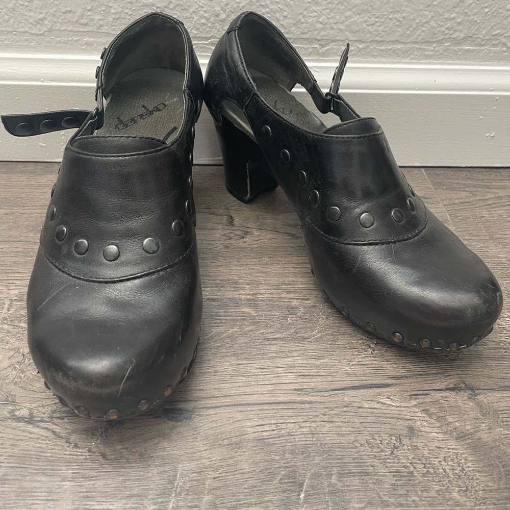 Dansko Black Leather Clogs with Perforated Design